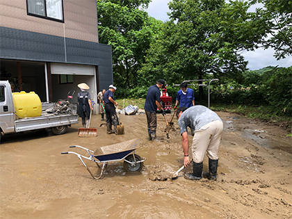 Removal of sediment at a neighboring house
